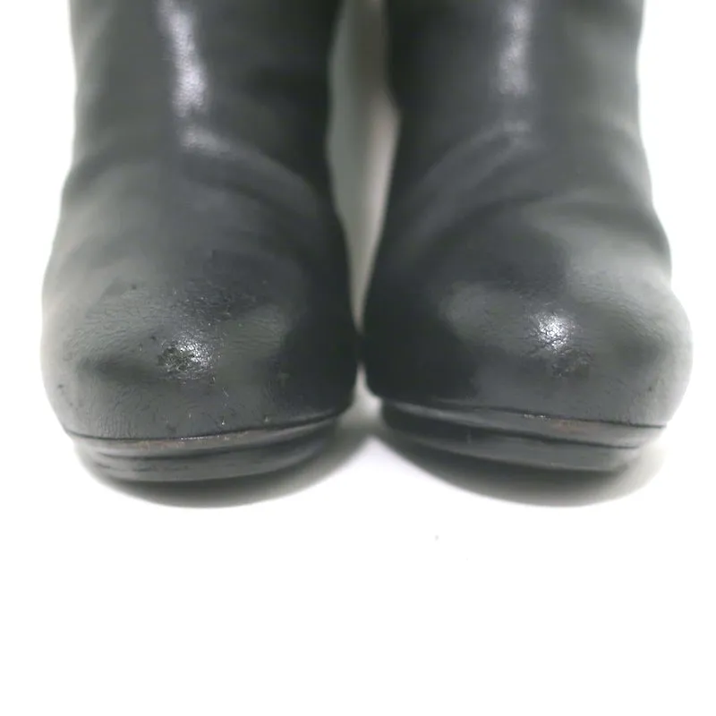 Balenciaga Bottes plateforme à hauteur de genou avec détail boucle en cuir noir grainé taille 38