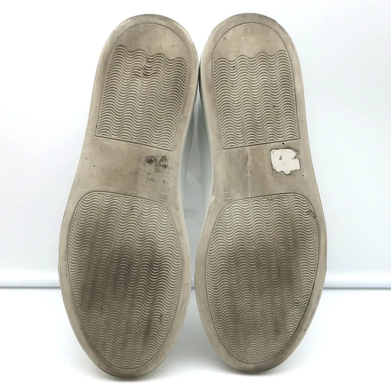 Baskets basses rétro Woman par Common Projects en cuir blanc et vert taille 37